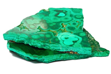 A slice of raw malachite: the mineral comes from the weathering of copper