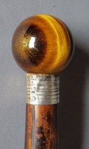 Walking stick with a tiger's eye pommel