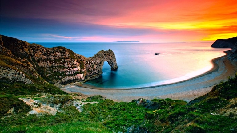 Sunset over a coastal landscape