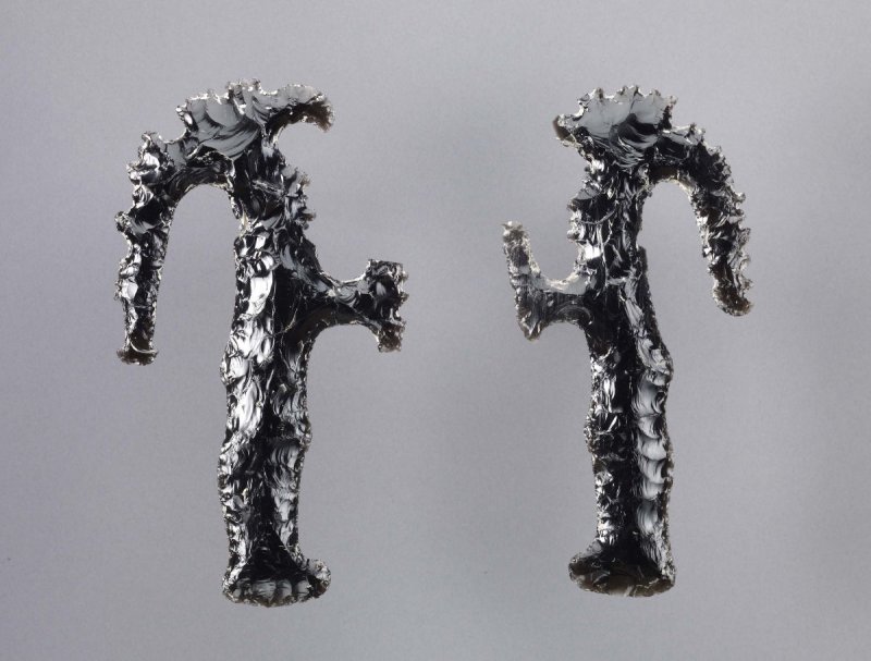 Maya statuettes in black obsidian
