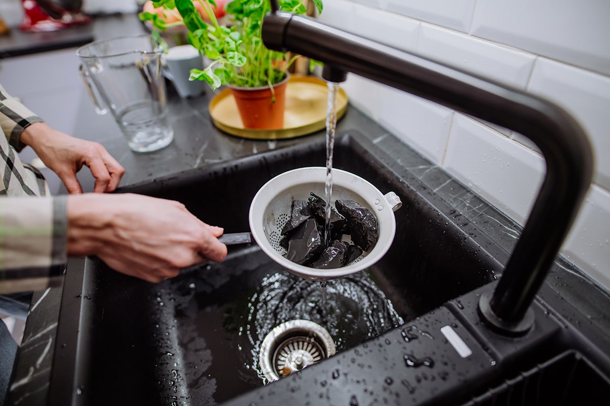 Shungite held under running tap water